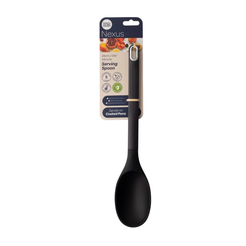 Black silicone solid serving spoon with textured handle and hanging loop, shown in packaging.