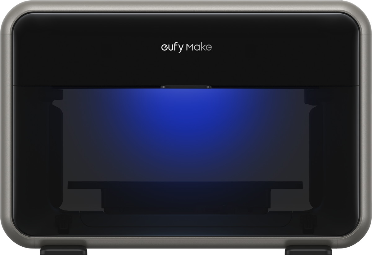 Front view of the Eufy Make E1 UV Printer with a black and gray compact modular design and blue interior light.