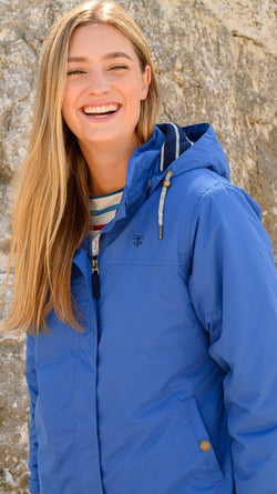 Eva Ladies mid-hip padded waterproof coat in deep indigo, insulated, breathable, windproof, with detachable hood - Keans