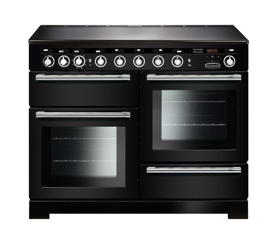 Rangemaster Encore Deluxe 110 induction range cooker in black with chrome trim, three ovens, and control knobs.