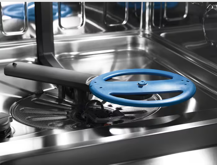 Close-up of the Electrolux Integrated 3 Drawer Dishwasher interior showing the spray arm and stainless steel tub.