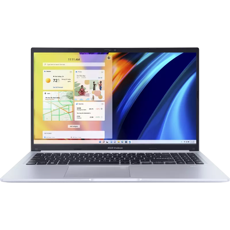ASUS 15.6" FHD silver laptop open, showing keyboard and screen with Windows 11 widgets and wallpaper