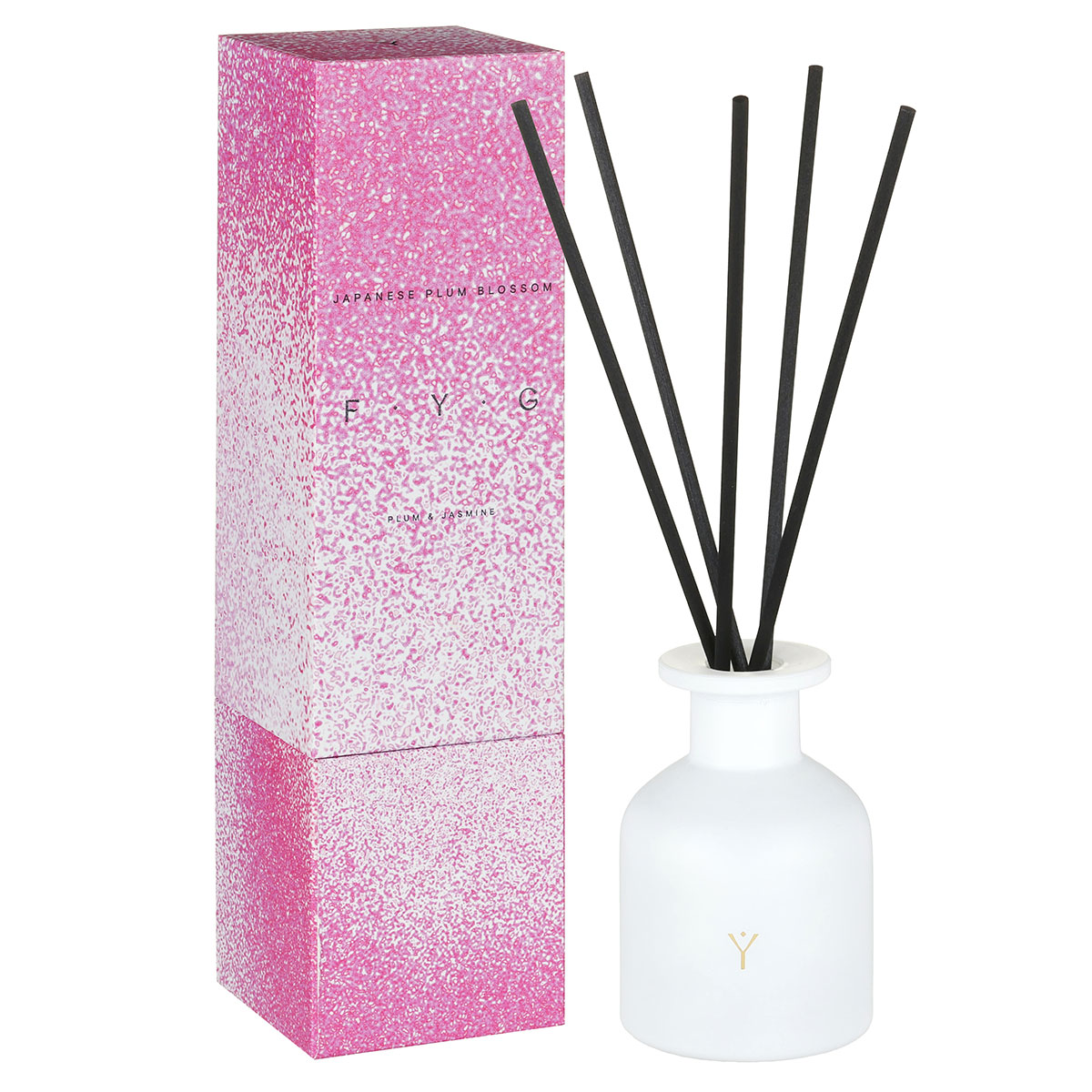 Japanese Plum Blossom diffuser with white frosted glass bottle and black reeds beside pink textured packaging box.