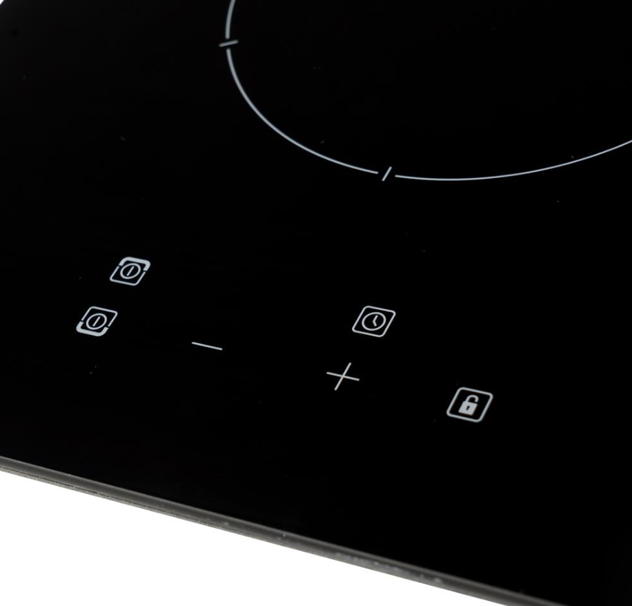 Close-up of CDA Domino Two Zone Ceramic Hob touch controls on black glass surface.