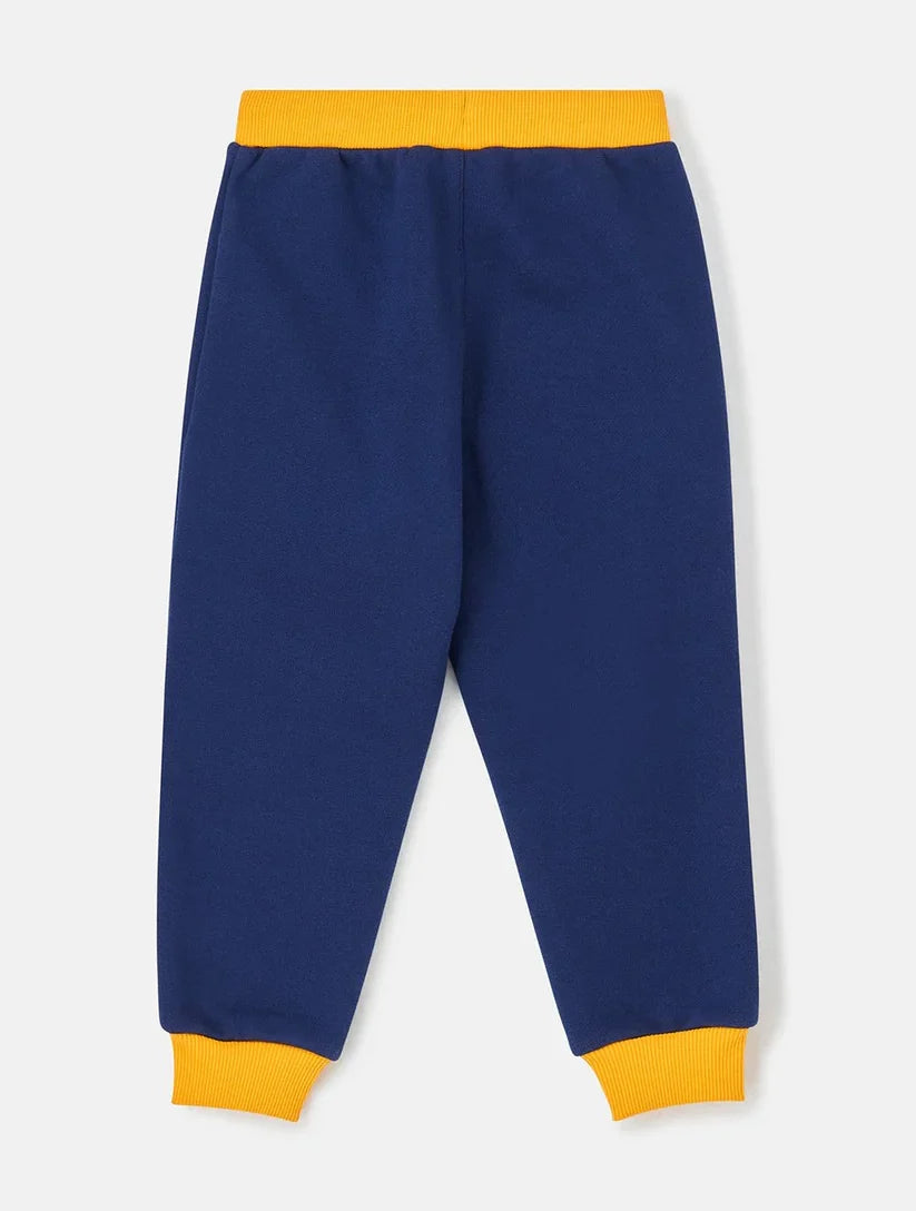 Navy blue George Jogger pants with bright yellow elastic waistband and cuffs, back view.