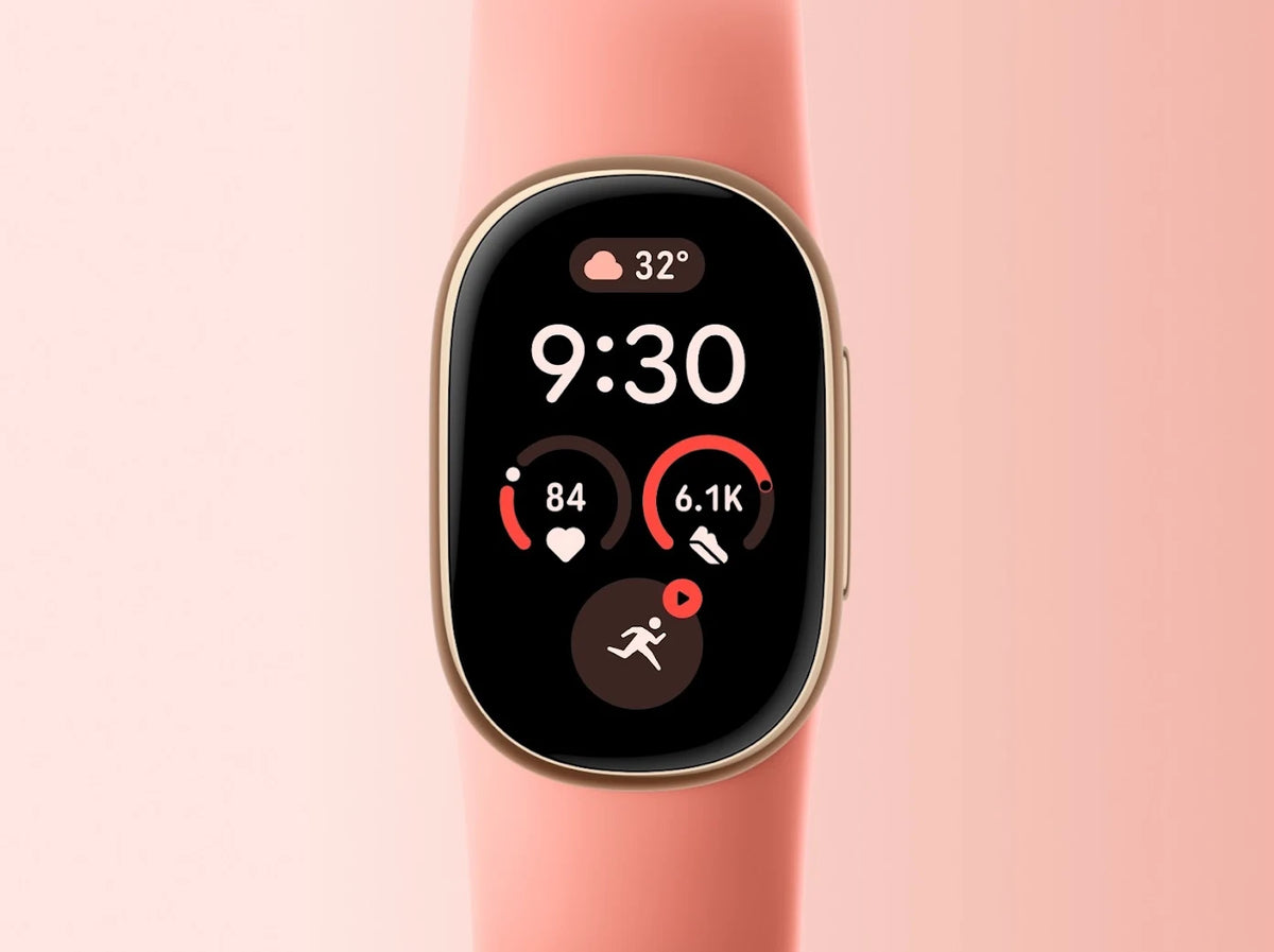 Angled view of Google Fitbit Edge Canyon Gold showing AMOLED display, Champagne Gold aluminium case and Canyon band