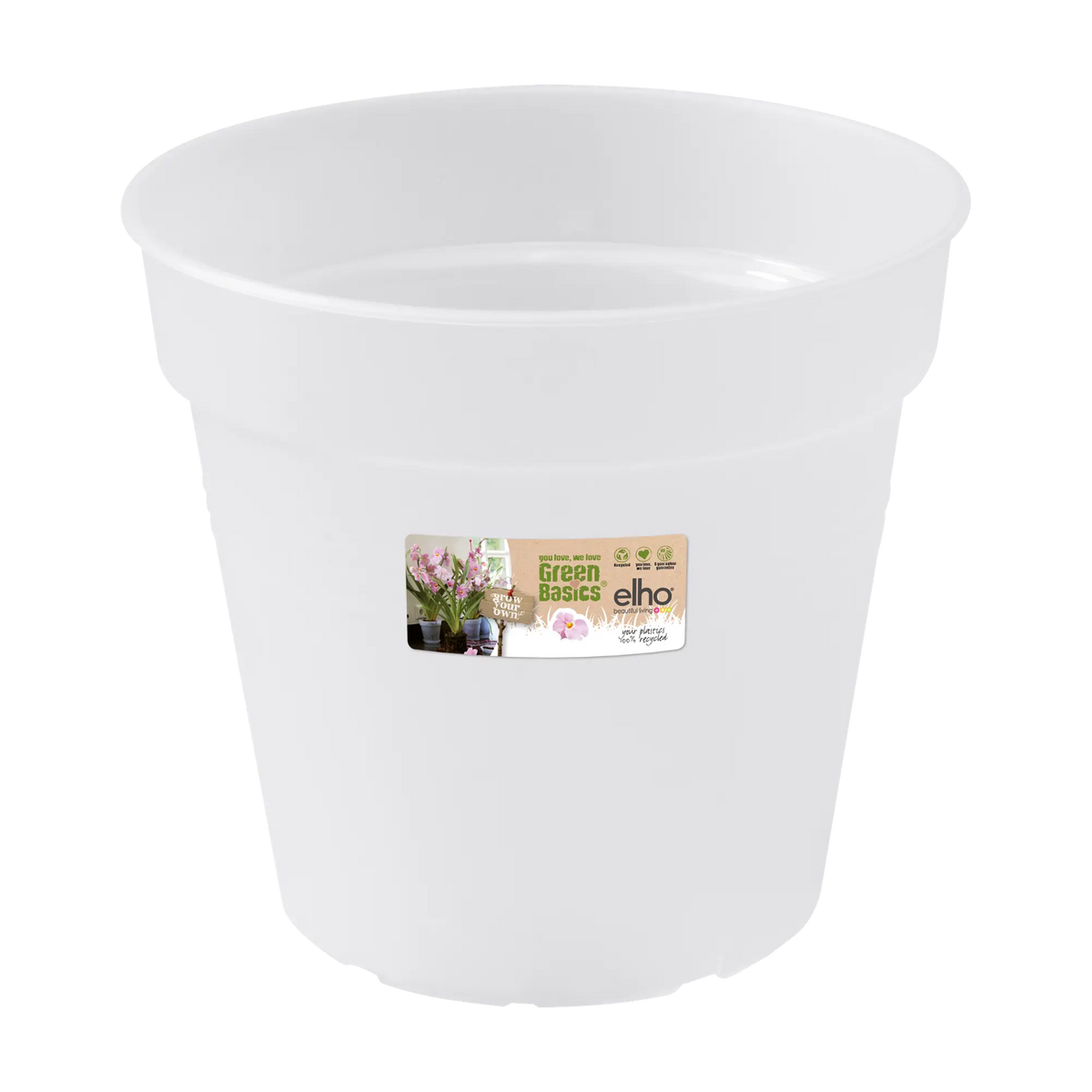 White translucent Green Basics Orchid plant pot with a label showing orchids and branding