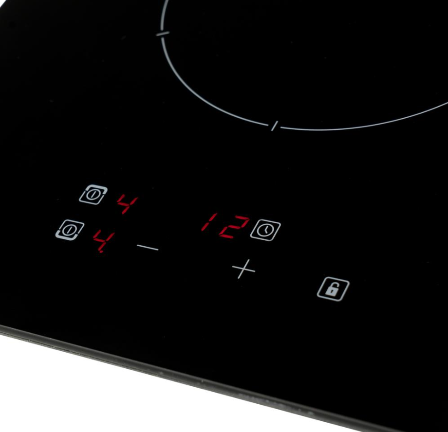 Close-up of CDA Domino Two Zone Ceramic Hob control panel with red digital display and touch buttons.