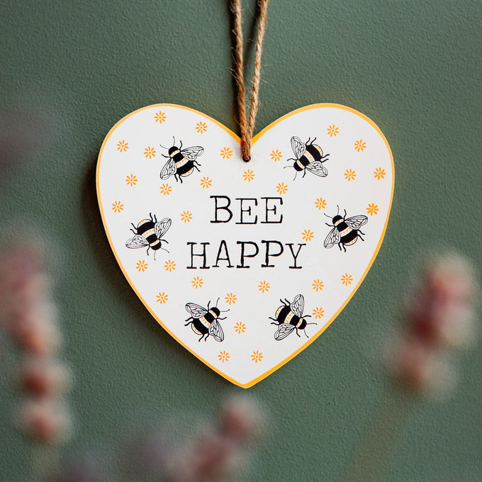 Bee Happy wooden heart plaque with jute hanger, white wood, black typography, yellow bee design – Keans Claremorris