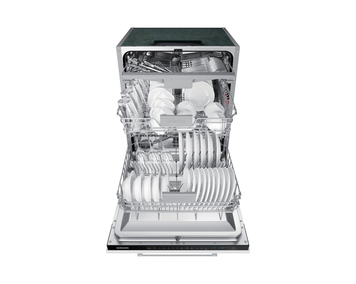 Samsung DW60CG550B00EU dishwasher with open door, loaded with dishes, glasses, and cutlery inside racks.