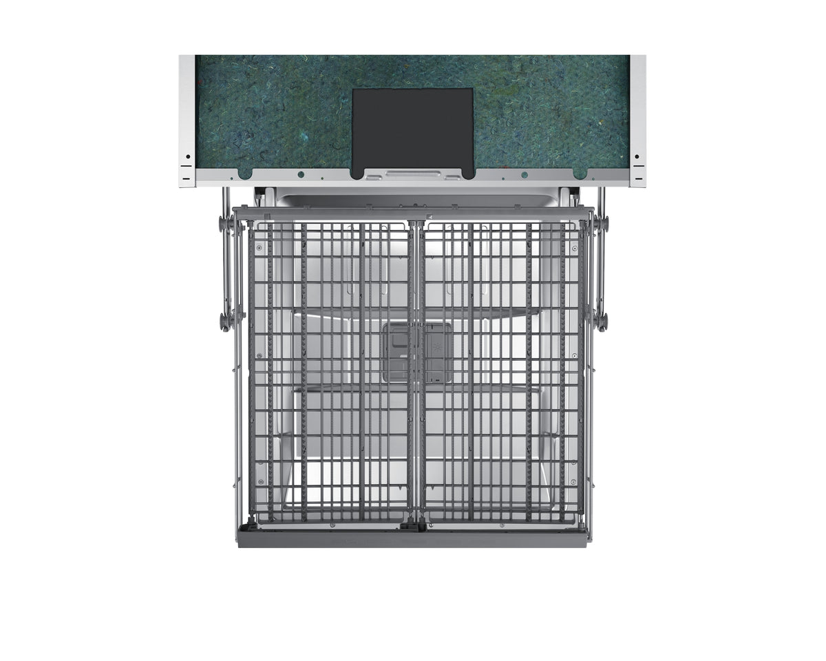 Open Samsung integrated dishwasher showing empty lower rack and interior tub in stainless steel finish.