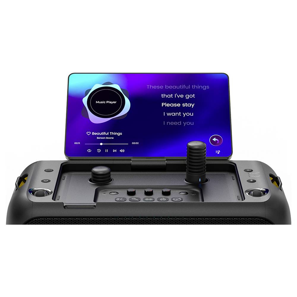 Ikarao Break X1 Karaoke touchscreen showing music player interface with microphone inserted on top panel.