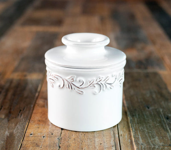 White Linen Antique Butter Bell crock with embossed vineyard design, keeps butter fresh without refrigeration | Keans