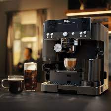 Ninja Luxe Café Espresso Bar Coffee Machine in black with espresso and coffee cups on a dark countertop.