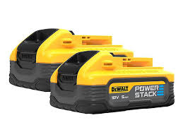 Two DeWalt 18V 5.0Ah Powerstack batteries side by side with yellow and black casing and LED charge indicators.