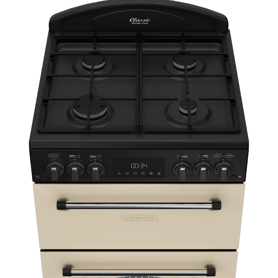Leisure 60cm cream gas range cooker with four burners and black control panel with knobs and digital display