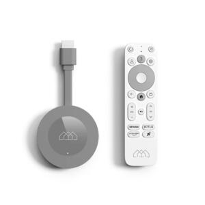 Google TV 4k Chromecast dongle in dark gray with a white remote control on a white background.