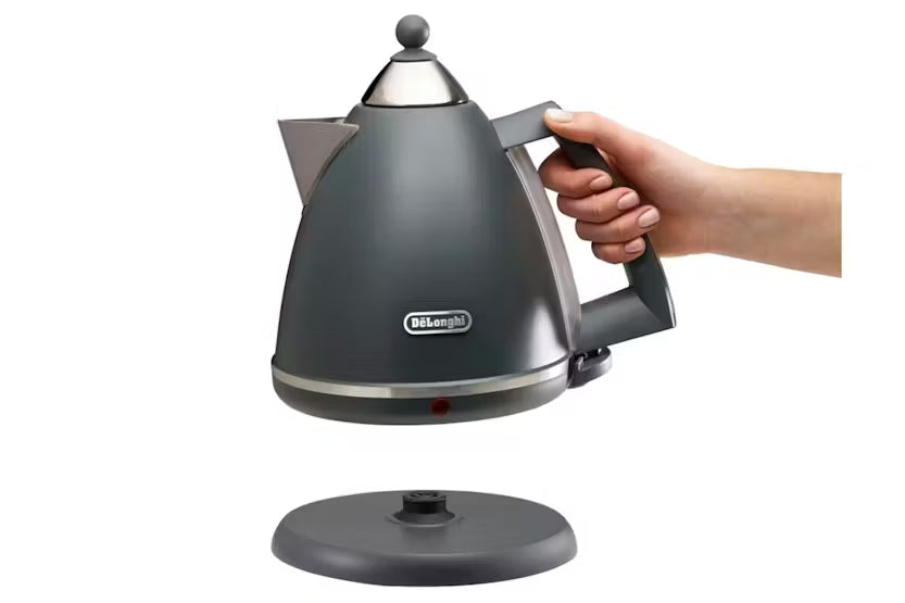 Delonghi Argento Silva Grey kettle held above its round base, showing side and handle details.