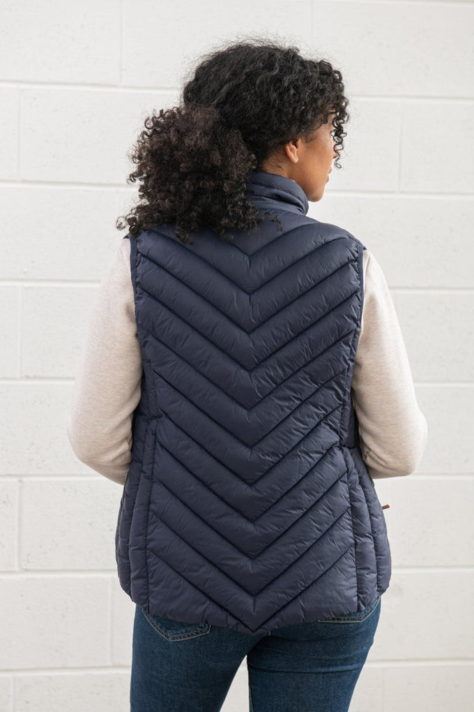 Laurel Ladies Navy Gilet, lightweight sleeveless jacket for women, stylish and warm, available at Keans Claremorris