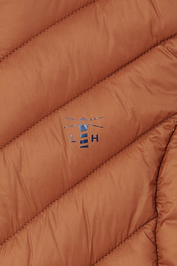 Laurel Ladies Gilet in Rust - Lightweight sleeveless jacket for women, available at Keans Claremorris