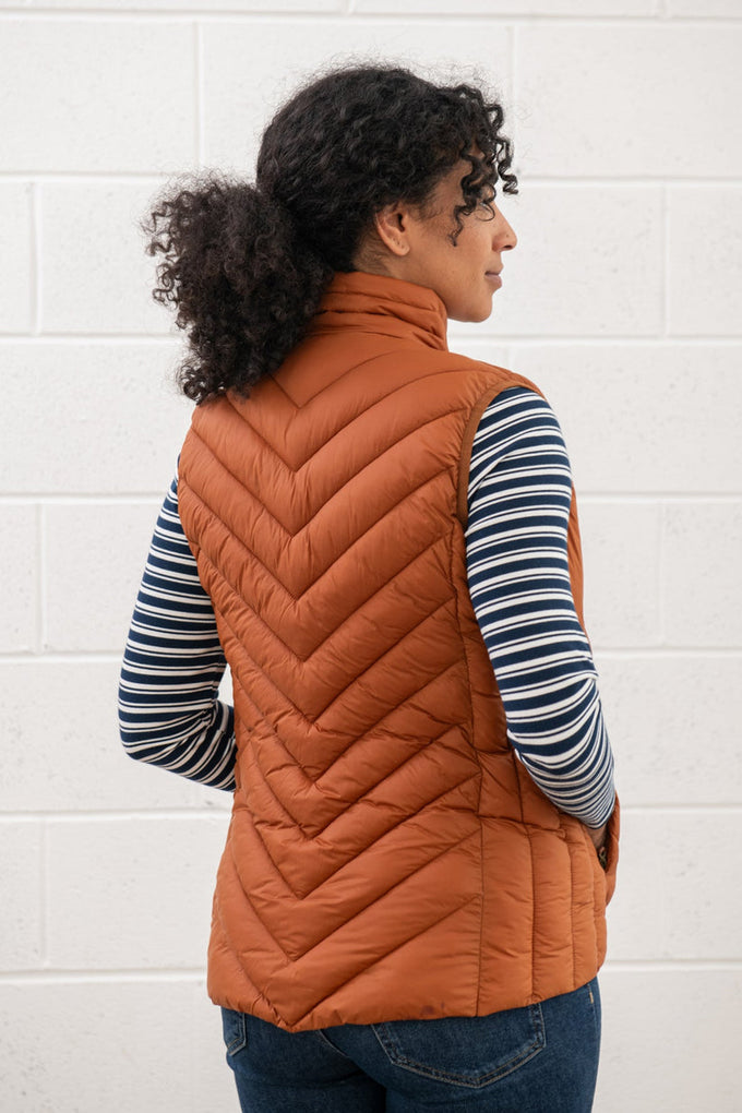 Laurel Ladies Gilet in Rust - Lightweight sleeveless jacket for women, available at Keans Claremorris.