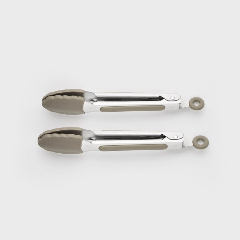 Two grey mini stainless steel tongs with silicone tips and handles, laid side by side on white background.