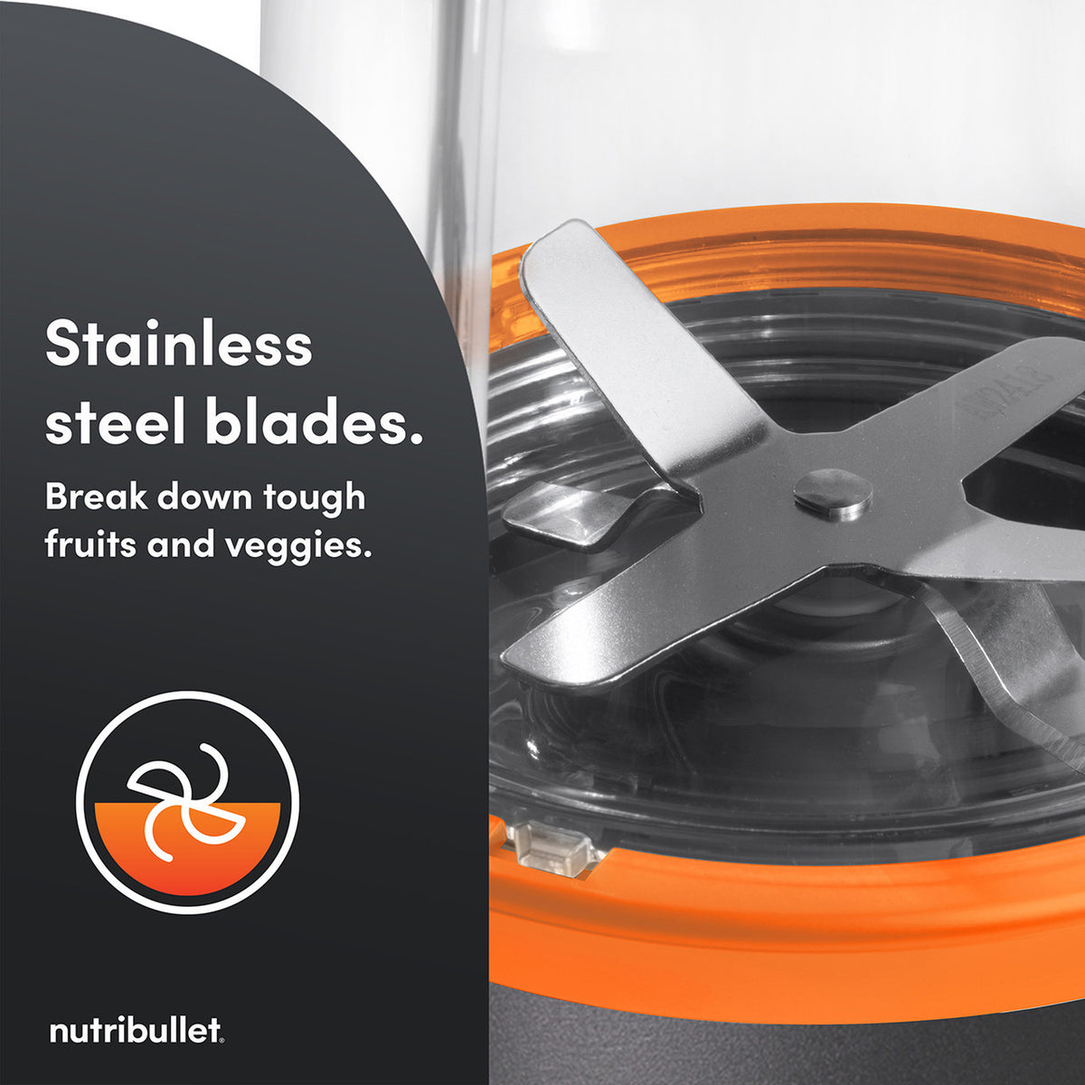 Close-up of Nutribullet 900 McLaren stainless steel blades with orange sealing ring inside the blender base.