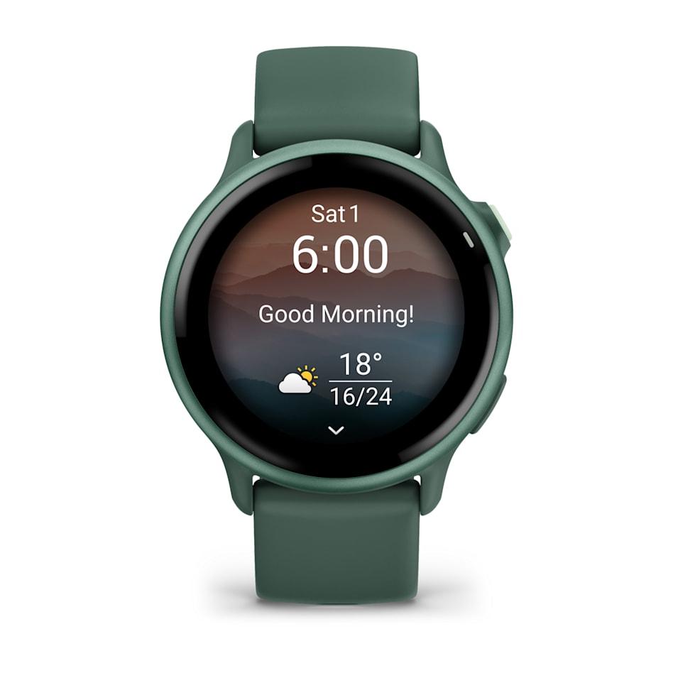 Garmin Vivoactive 6 smartwatch in jasper green showing time, date, weather, and greeting on screen.