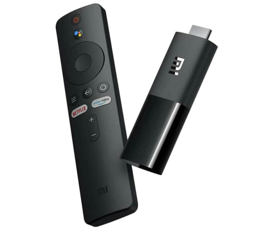 Xiaomi Mi TV Stick with black voice remote featuring Netflix and Prime Video buttons, angled view.