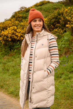 Savannah Ladies Long Gilet in Irish Cream, padded, water-repellent, detachable hood, two pockets by Keans Claremorris.