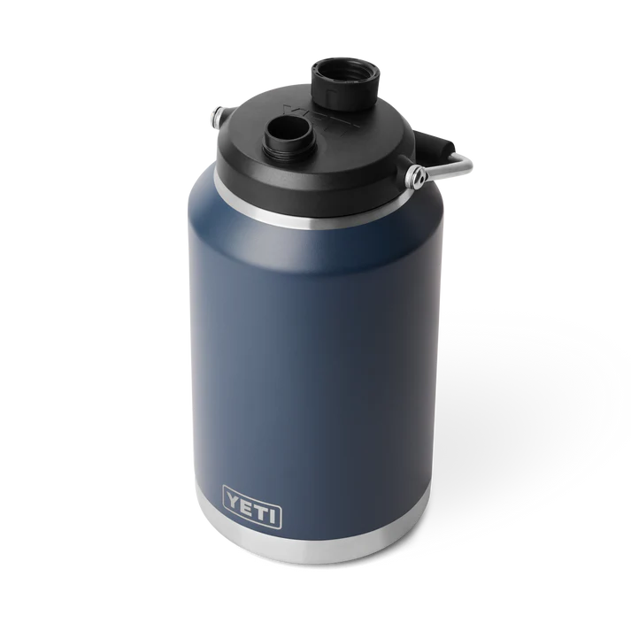 Yeti Rambler One Gallon Jug in navy with black lid and silver handle, shown from a high angle.