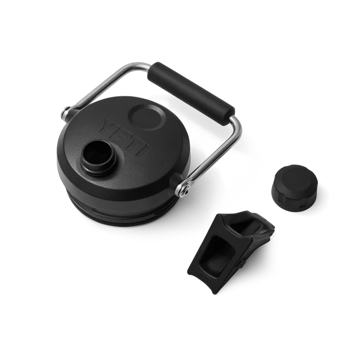 Black Yeti Rambler One Gallon Jug navy lid with handle, spout, and two separate black accessories on white background