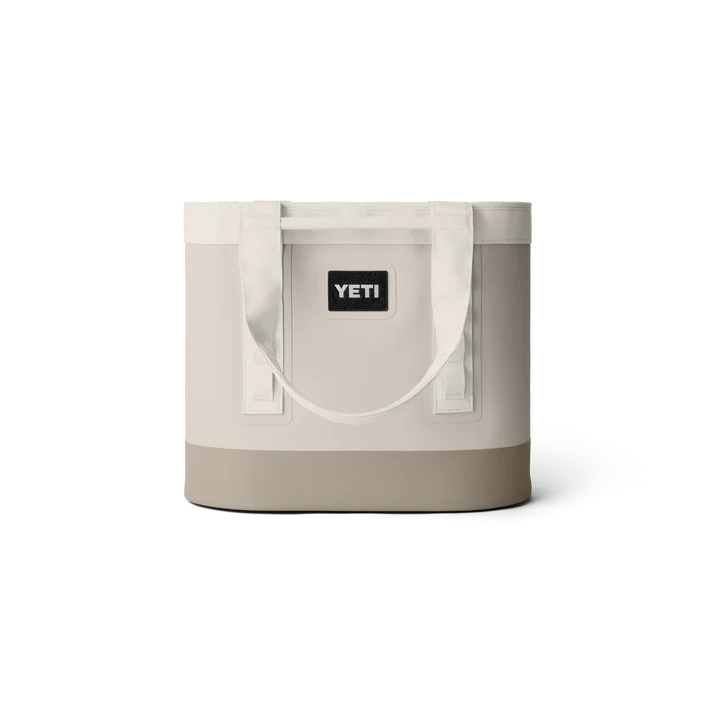 YETI Camino Carryall 35 tote bag in Cape Taupe, front view with logo patch and dual handles