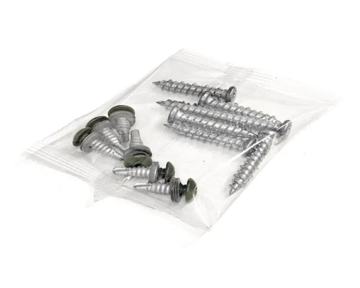 Clear plastic bag containing six silver concrete screws and six olive green-headed Tex screws for SmartFence installation.