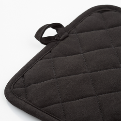 Black Stellar Textiles pot holder, heat-resistant kitchen accessory, available at Keans Claremorris.