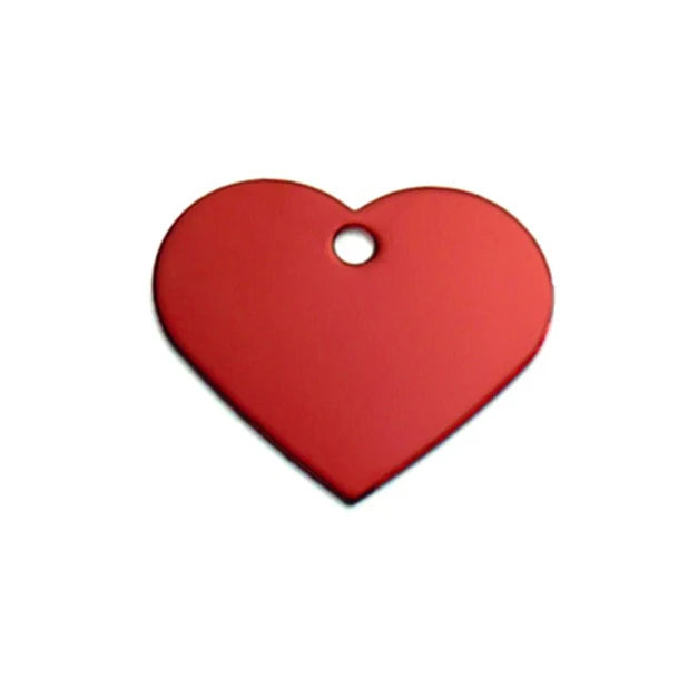 Red heart-shaped metal pet ID tag, double-sided engraving for name and number, durable design by Keans Claremorris.