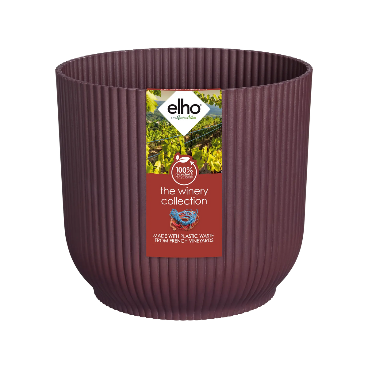 Round ribbed planter in Bordeaux red with a label showing vineyard imagery and recycling information
