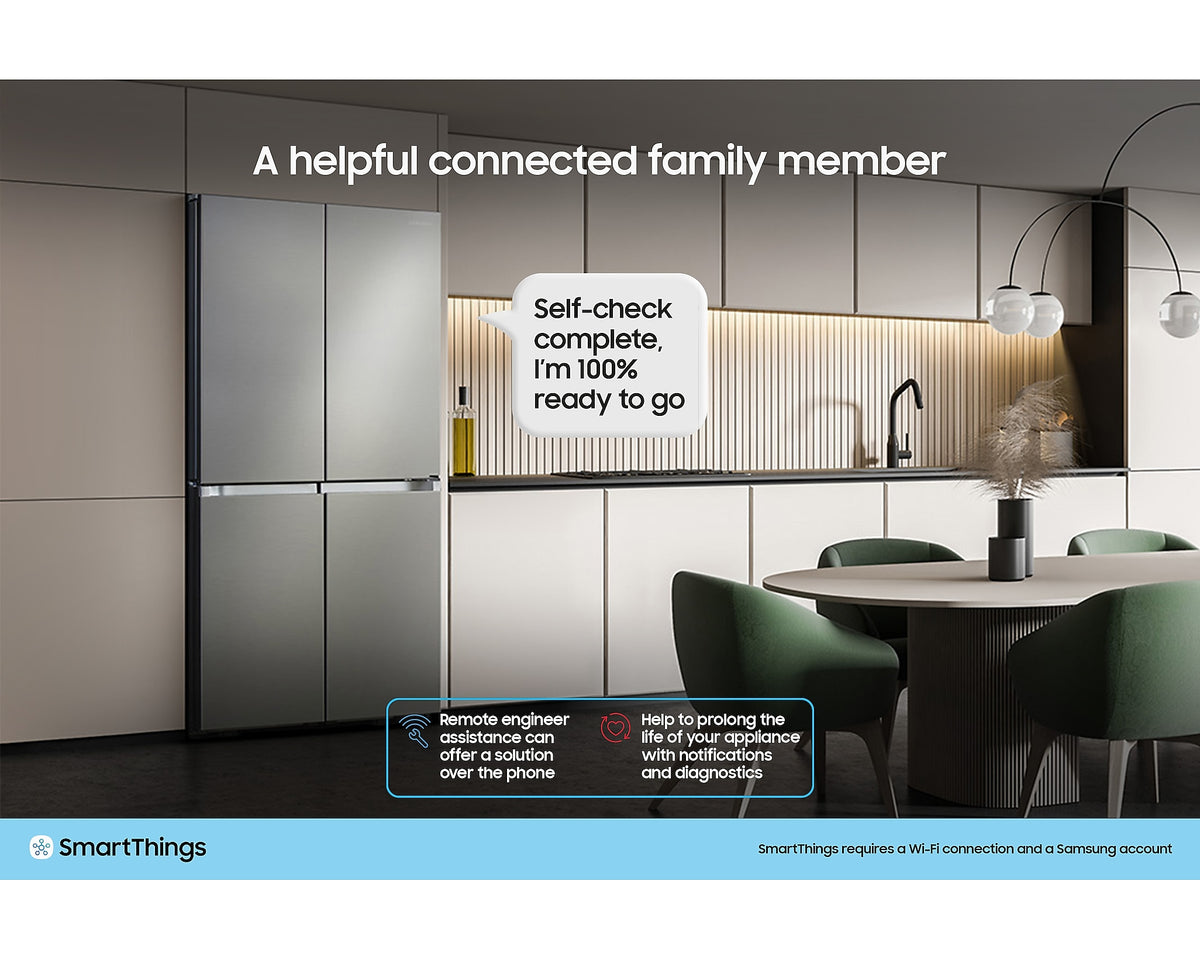 Samsung Series 8 silver American fridge freezer in a modern kitchen with beige cabinets and green chairs.