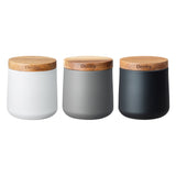 Denby 3-piece mixed storage canisters in white, grey, black with Acacia wood lids, airtight seal, at Keans Claremorris.