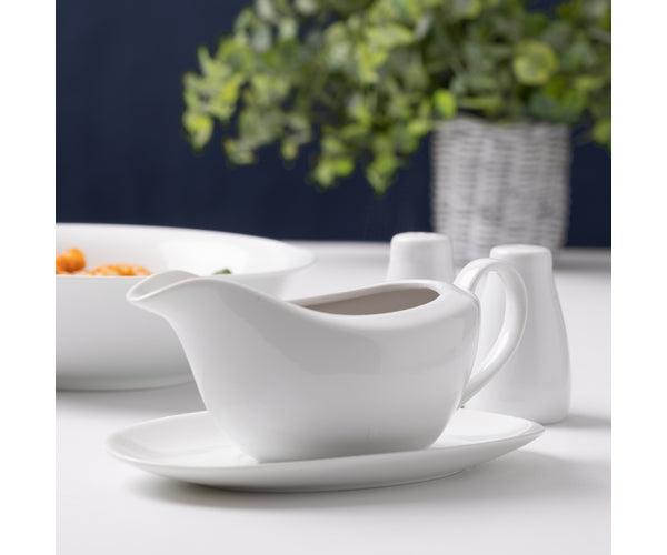 Simplicity Gravy Boat and Saucer set, elegant white ceramic design, perfect for serving sauces – available at Keans