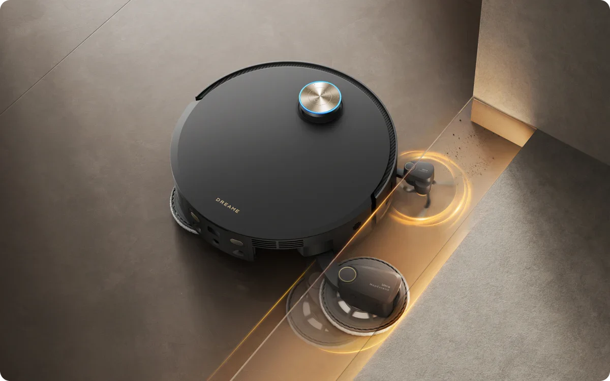 Dreame X60 Pro Ultra robot vacuum in black cleaning along a floor edge with glowing cleaning effect.