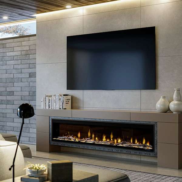 Dimplex Ignite Evolve 74" frameless electric fireplace with edge-to-edge glass, lit with realistic flames in modern living