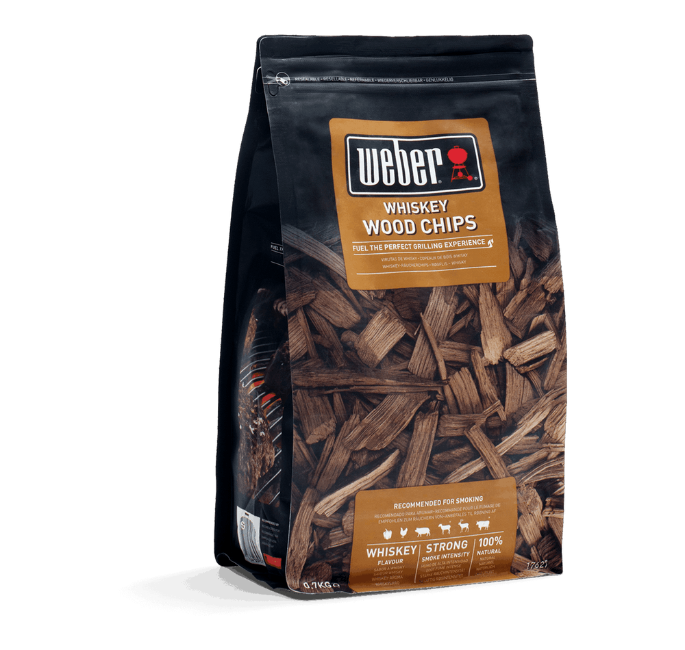 Weber Whiskey Oak Wood Chips 0.7kg for sweet smoky BBQ flavor, natural oak, perfect for pork & poultry, available at Kean’s