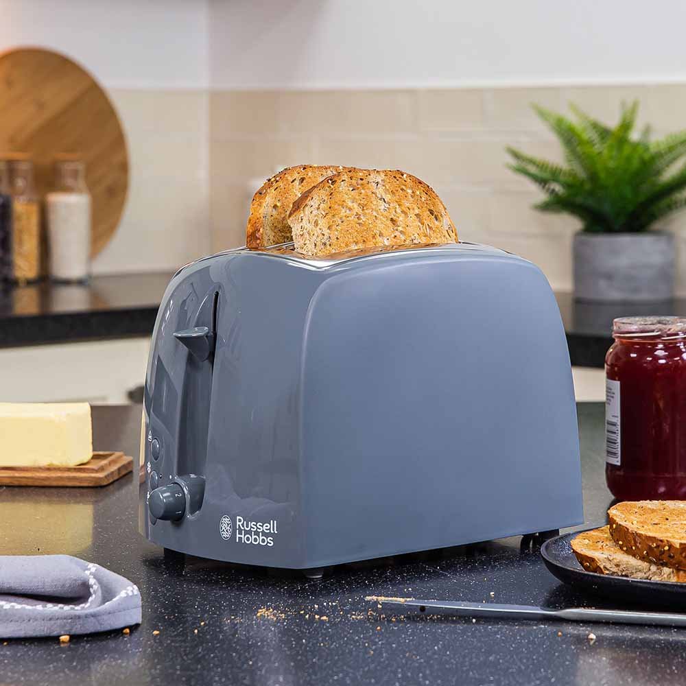 Russell Hobbs Textures Grey 2 Slice Toaster with wide slots, variable browning, chrome accents – available at Kean’s