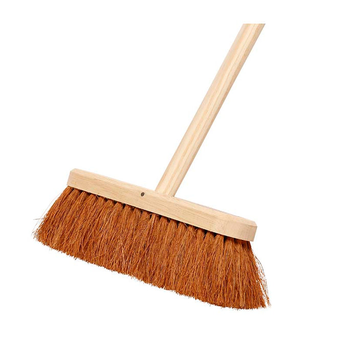 11″ red coco fibre brush with soft bristles and timber handle for indoor sweeping, available at Keans Claremorris.