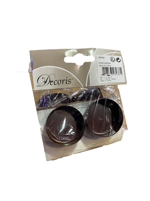 Brown iron tea light holder on pin, Christmas decoration by Keans Claremorris, festive home decor accessory.