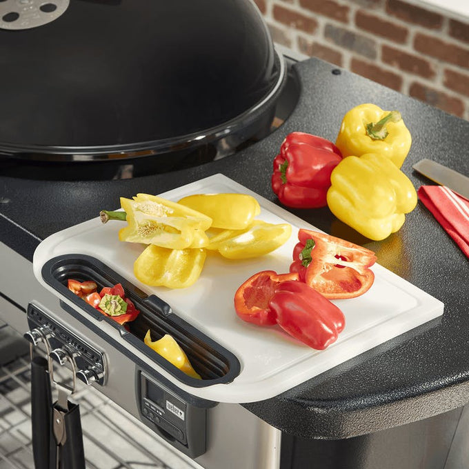 Weber Traveler Cut & Catch Cutting Board with built-in catch tray – durable kitchen tool available at Keans Claremorris.