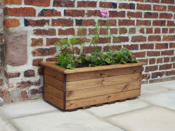 Medium Trough Planter in Scandinavian Redwood with slatted base for drainage, preservative treated, by Keans Claremorris.