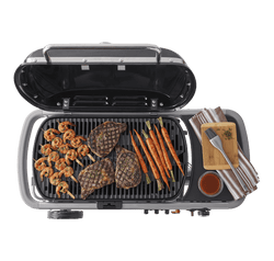 Weber Traveller BBQ portable charcoal grill, compact design for easy travel, available at Keans Claremorris.