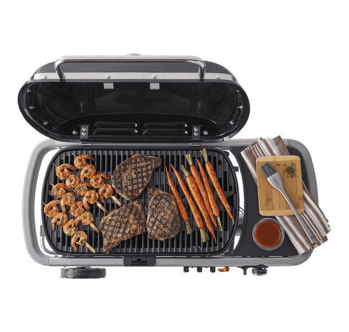 Weber Traveller BBQ portable charcoal grill, compact design for easy travel, available at Keans Claremorris.